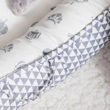 Nid d’ange en coton respirant pour un confort optimal de bébé