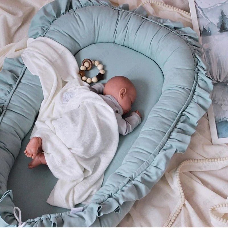 Cocon de sommeil bébé avec matelas anti-choc