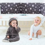 Tour de lit doux et moelleux créant un nid douillet pour bébé