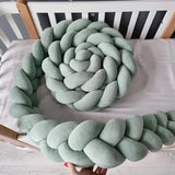 Tresse de lit cocon Envolée de Douceur rose pour lit bébé